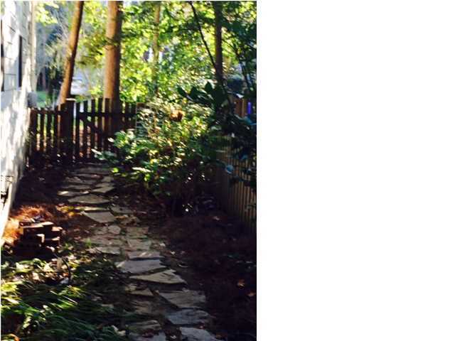 652 Fair Spring Drive Charleston, SC 29414 - Photo 4 of 23 Path way to backyard