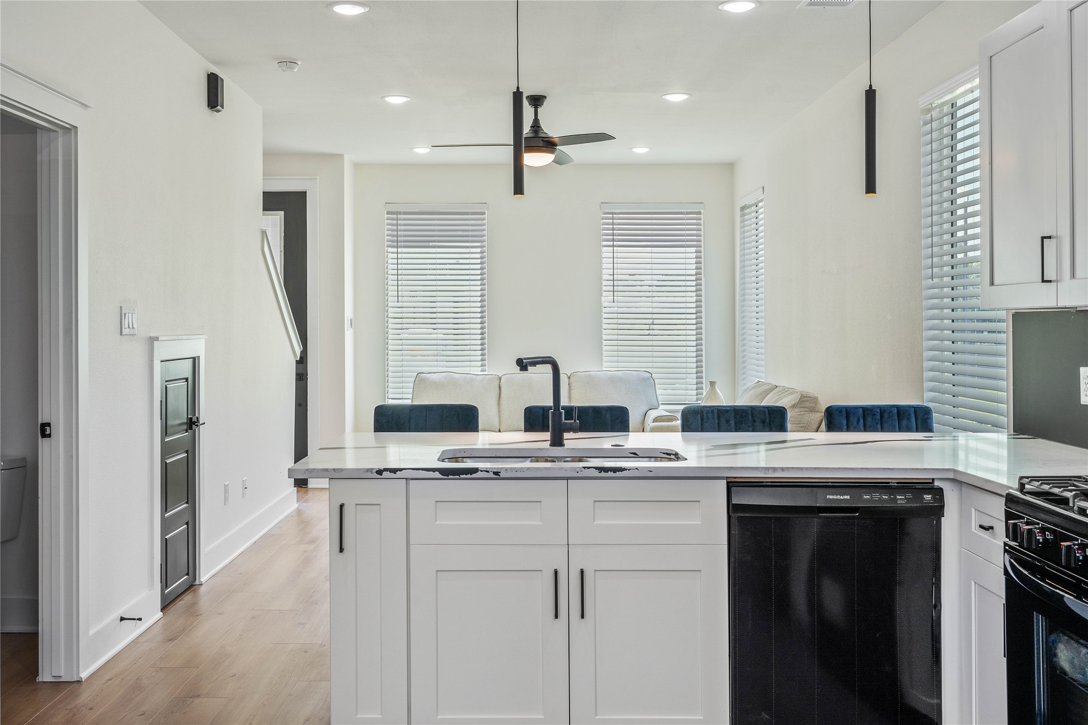 3522 Mansfield Street Houston, TX 77091 - Photo 12 of 18 a kitchen with stainless steel appliances granite countertop a sink a stove and a refrigerator