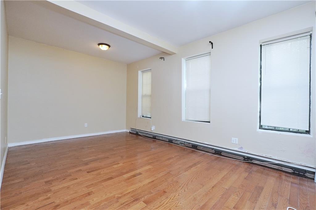 587 Van Siclen Avenue Brooklyn, NY 11207 - Photo 23 of 34 a view of an empty room