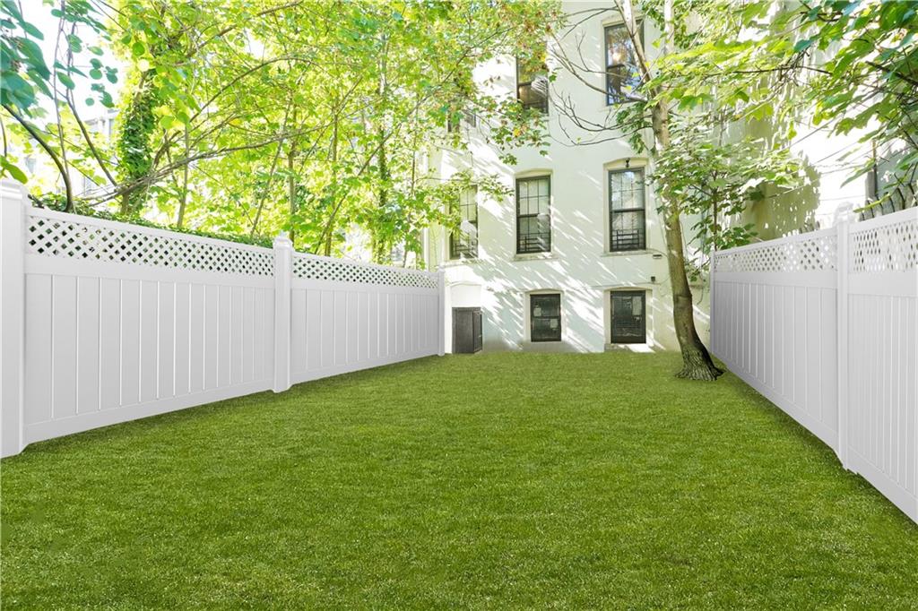 587 Van Siclen Avenue Brooklyn, NY 11207 - Photo 33 of 34 a view of a backyard