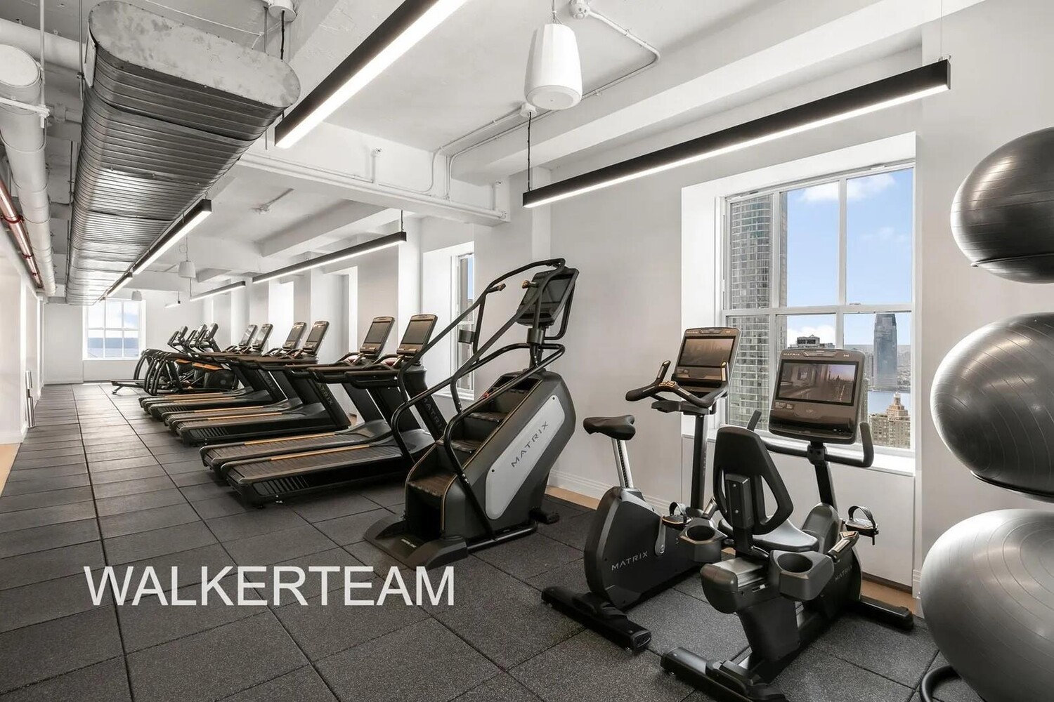 1 Wall Street, Unit 710 Manhattan, NY 10005 - Photo 15 of 19 a view of a room with gym equipment