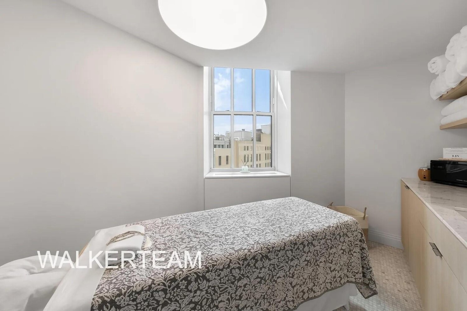 1 Wall Street, Unit 710 Manhattan, NY 10005 - Photo 17 of 19 a bedroom with a bed and a window