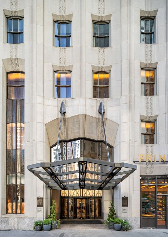 1 Wall Street, Unit 710 Manhattan, NY 10005 - Photo 10 of 19 a view of building with glass windows and door