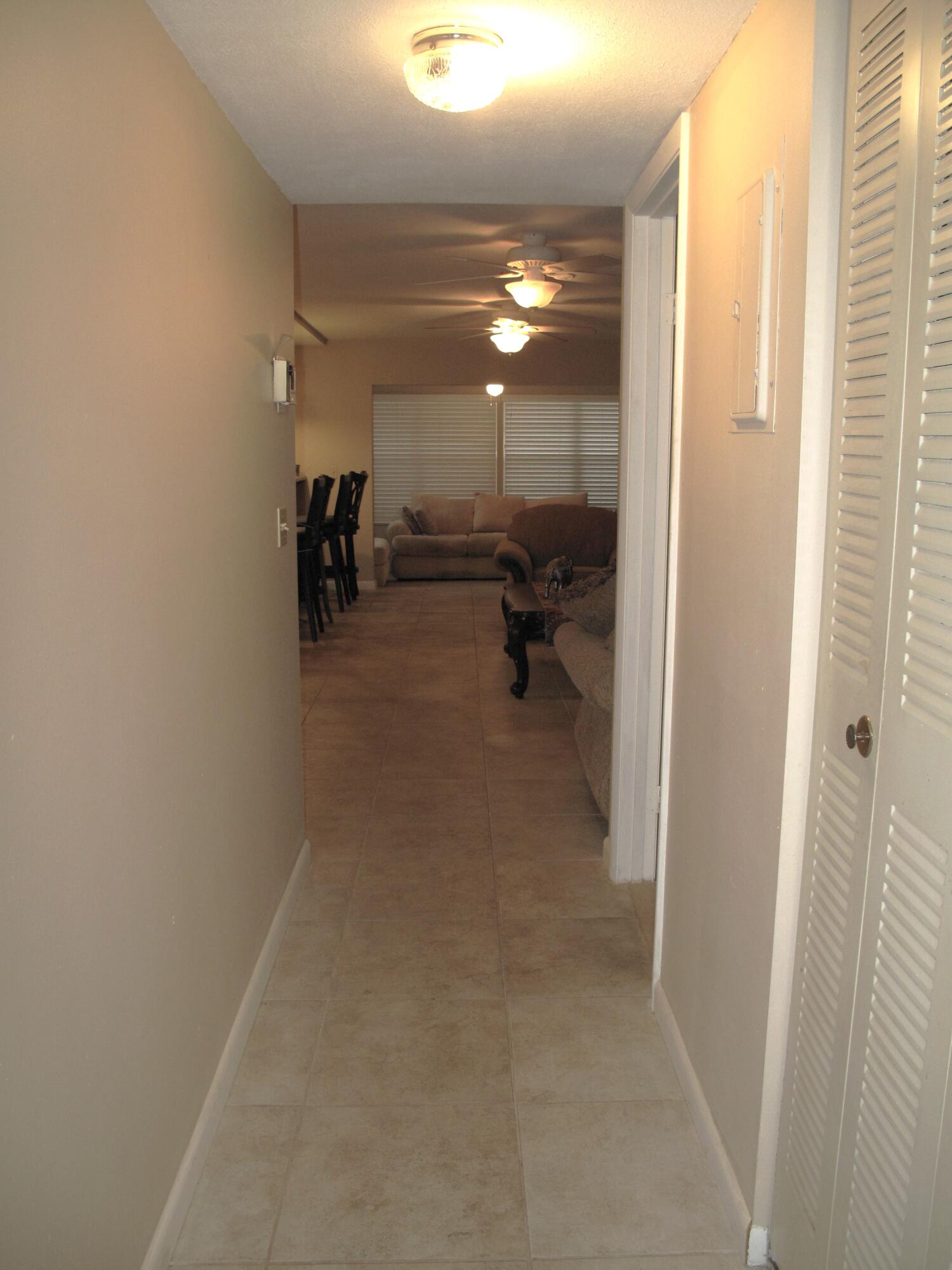 1315 High Point Way Southeast, Unit B Delray Beach, FL 33445 - Photo 14 of 41 a view of a room with utility room