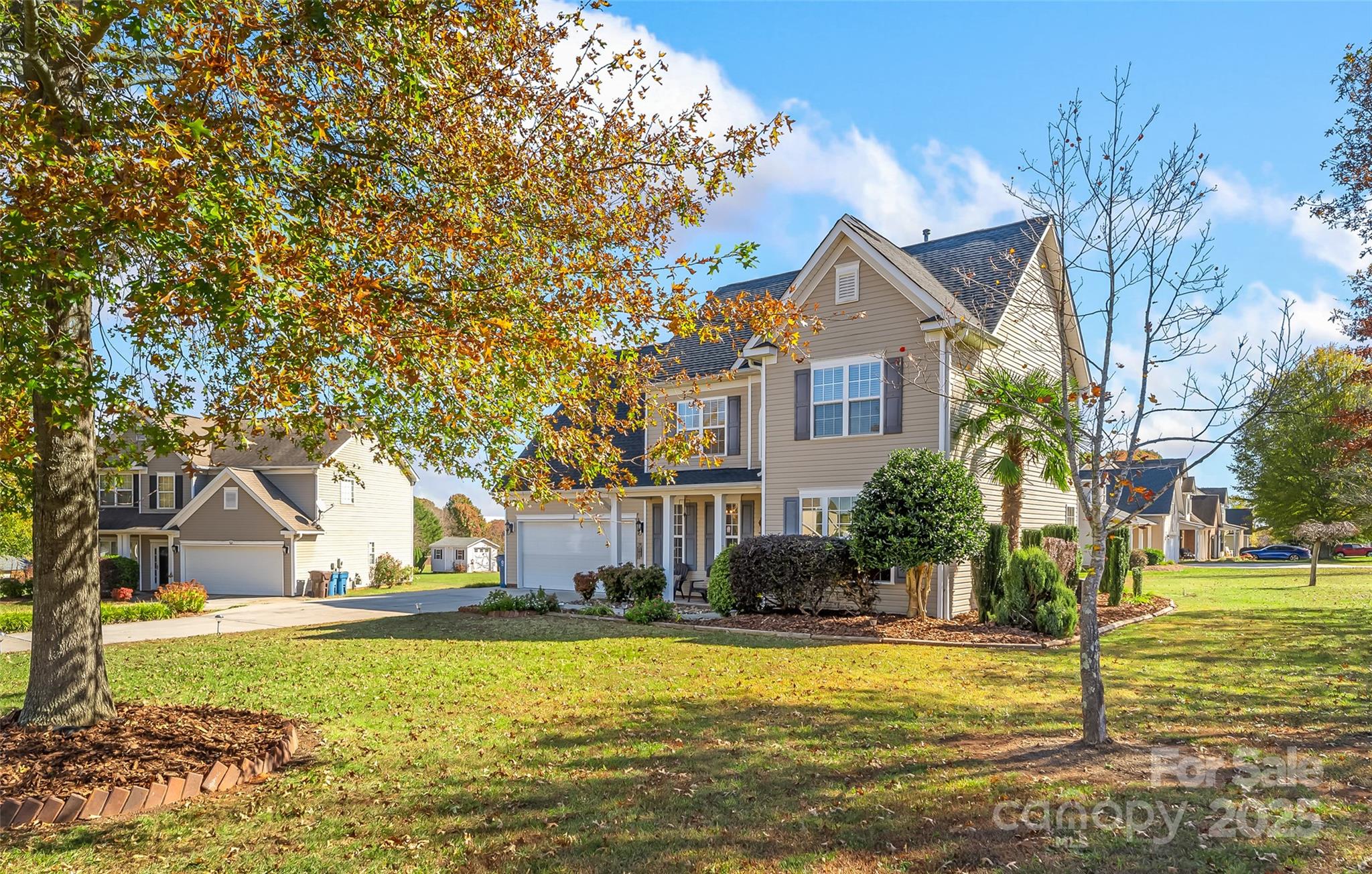 1450 Jc Raulston Court Hickory, NC 28602 - Photo 2 of 35 a front view of a house with a yard and lake view