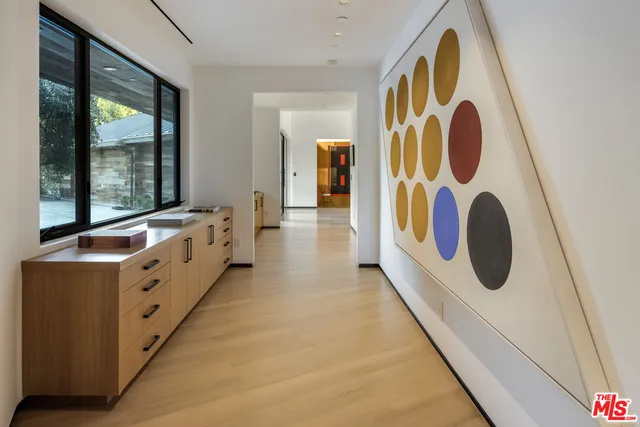 a bathroom with a tub sink and window