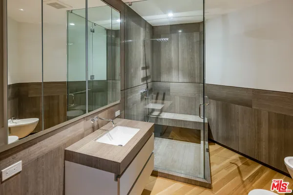 an aerial view of a house with swimming pool