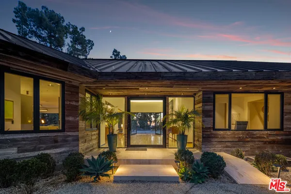 a front view of a house with a porch