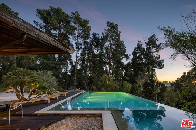 a view of yard with patio