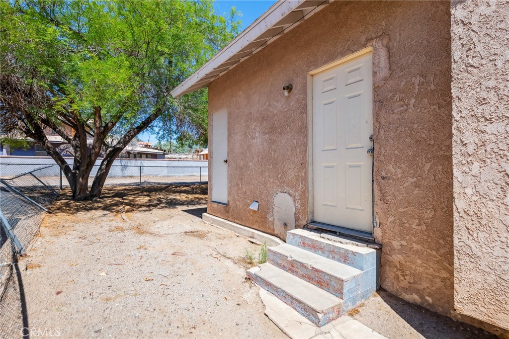 518 A Street Needles, CA 92363 - Photo 23 of 49 a view of a backyard of the house