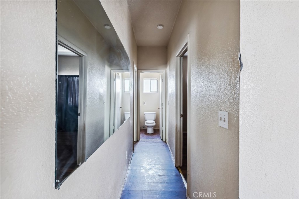 518 A Street Needles, CA 92363 - Photo 32 of 49 a view of hallway with wooden floor