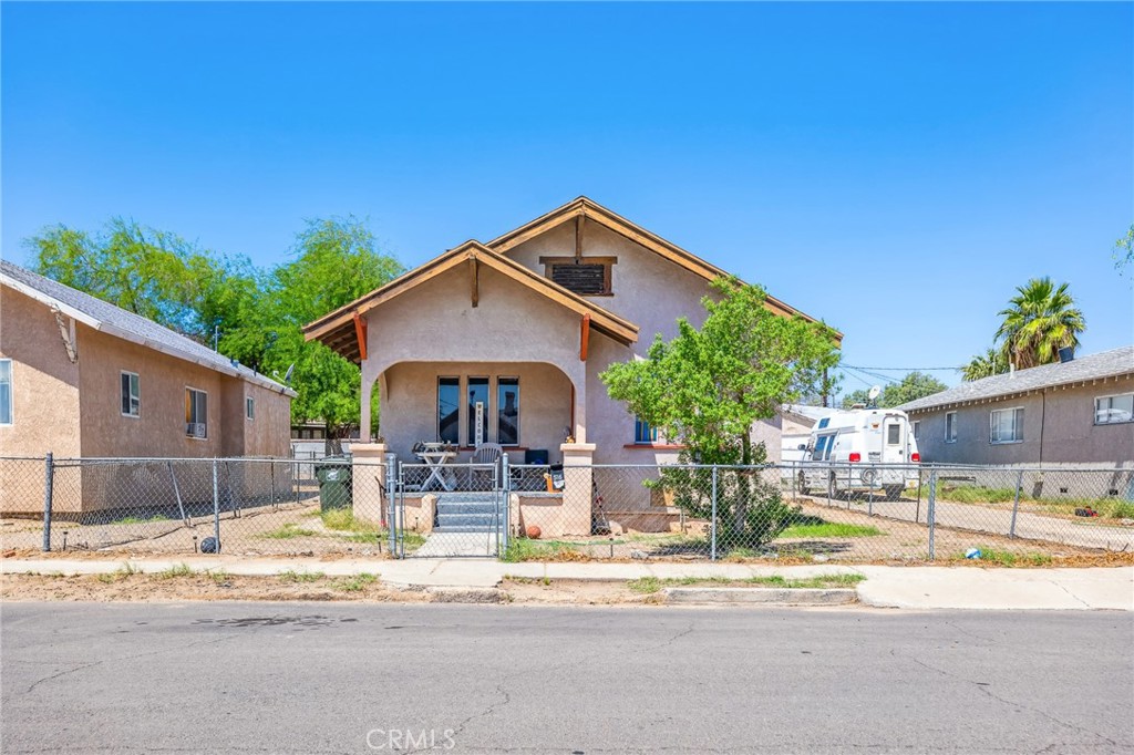 518 A Street Needles, CA 92363 - Photo 36 of 49 a front view of a house with a outdoor space