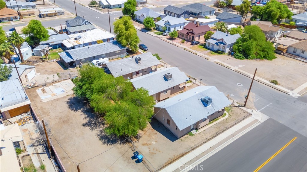518 A Street Needles, CA 92363 - Photo 48 of 49 an aerial view of residential houses with outdoor space