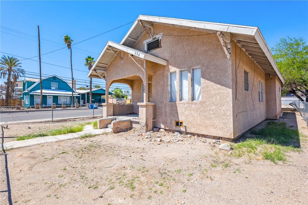 518 A Street Needles, CA 92363 - Photo 7 of 49 a view of a house with a park