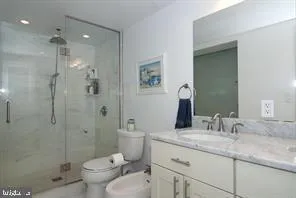 a view of two chairs in the balcony