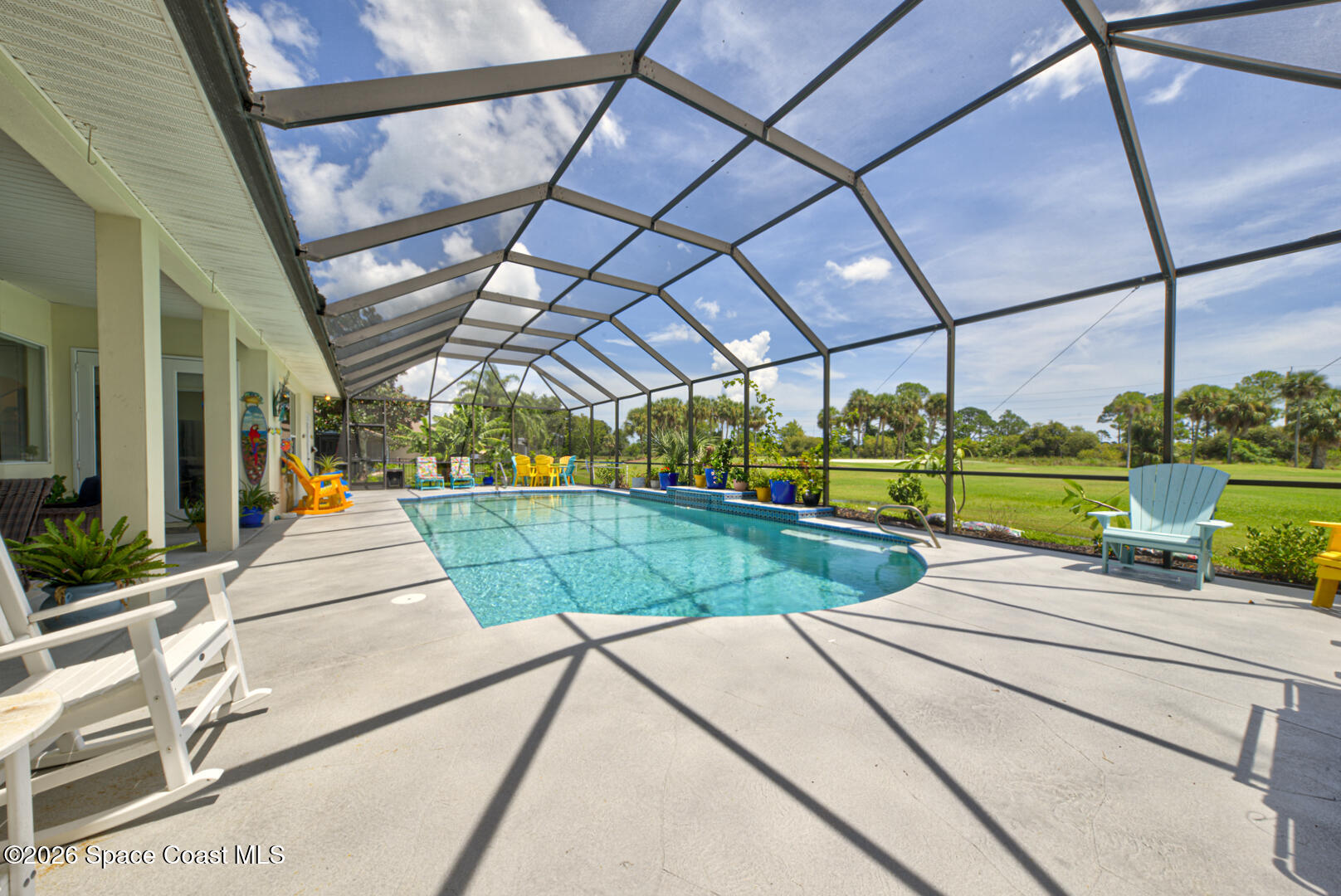 4056 Sand Ridge Drive Merritt Island, FL 32953 - Photo 57 of 69 screened in pool with golf course view