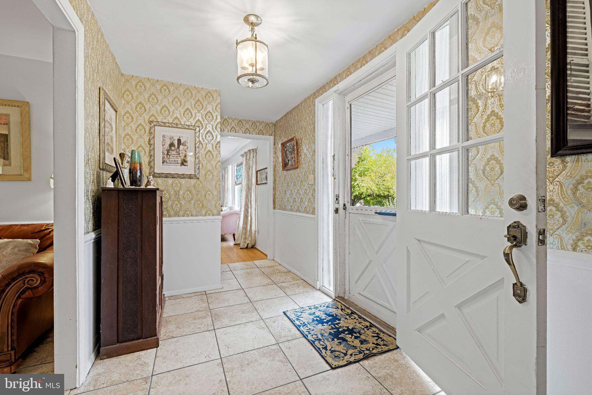 2114 Pot Spring Road Lutherville-Timonium, MD 21093 - Photo 5 of 49 Wide entry toyer with vintage wallpaper