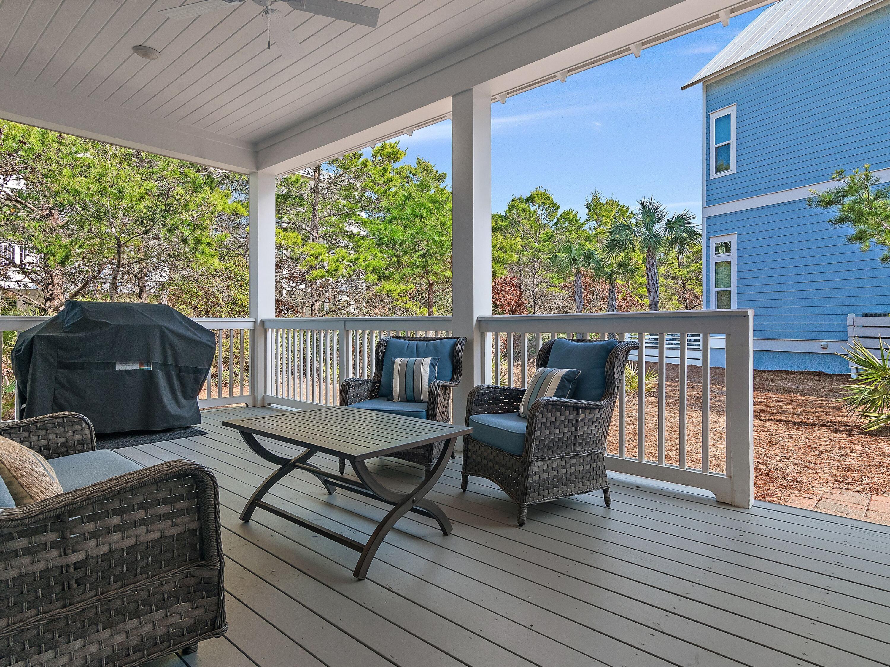93 East Crabbing Hole Ln Inlet Beach Inlet Beach, FL 32461 - Photo 15 of 49 a outdoor living space with furniture and garden view