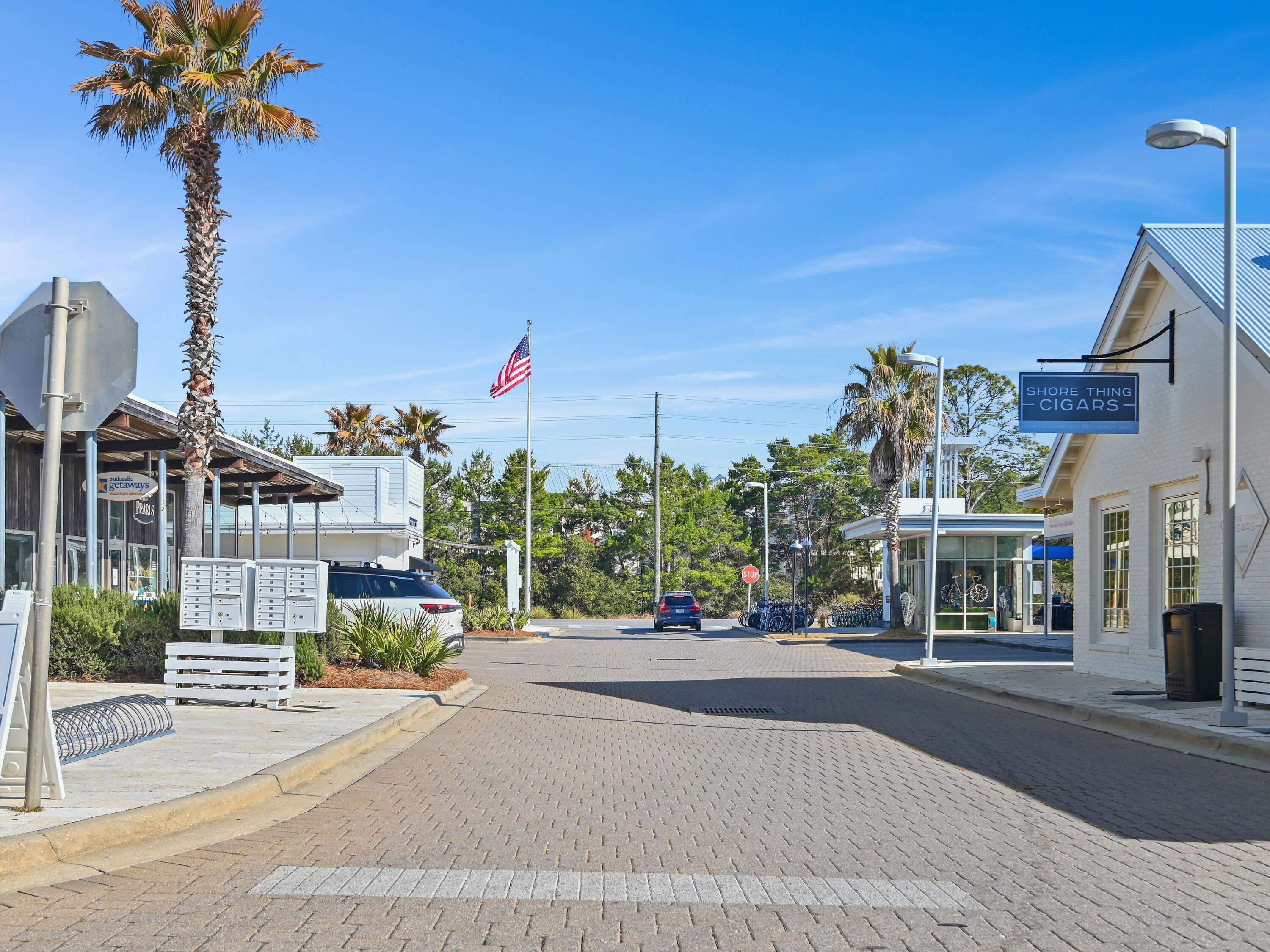 93 East Crabbing Hole Ln Inlet Beach Inlet Beach, FL 32461 - Photo 46 of 49 a view of a street with a building in the background