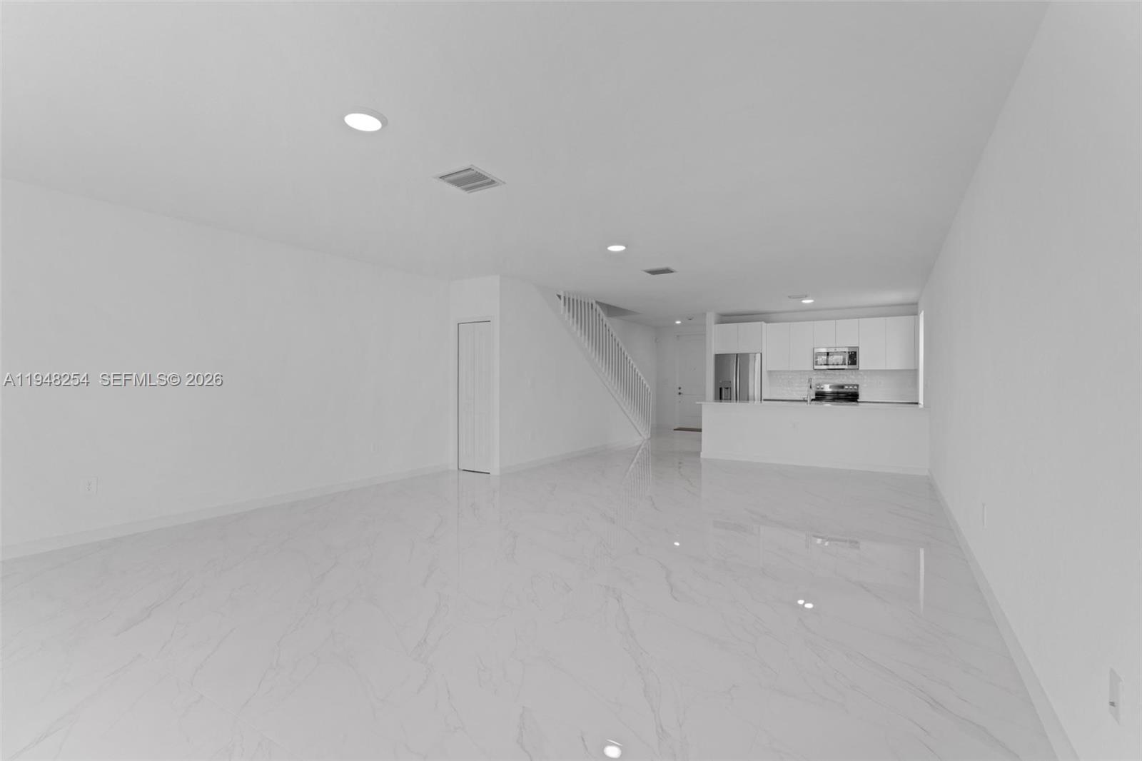 27335 Southwest 133rd Path Homestead, FL 33032 - Photo 7 of 39 a view of a big room with closet and windows