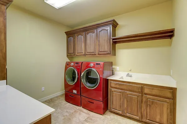 a utility room with dryer and washer