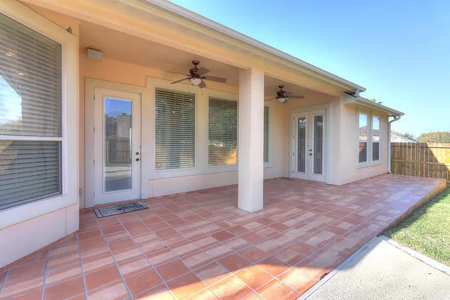 a view of a backyard with a garden