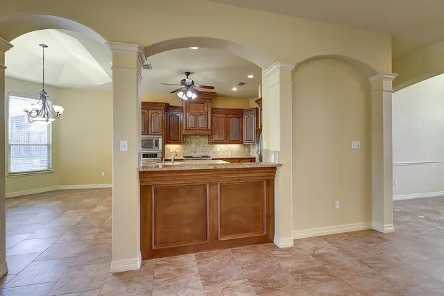 a bathroom with a sink a vanity and a mirror