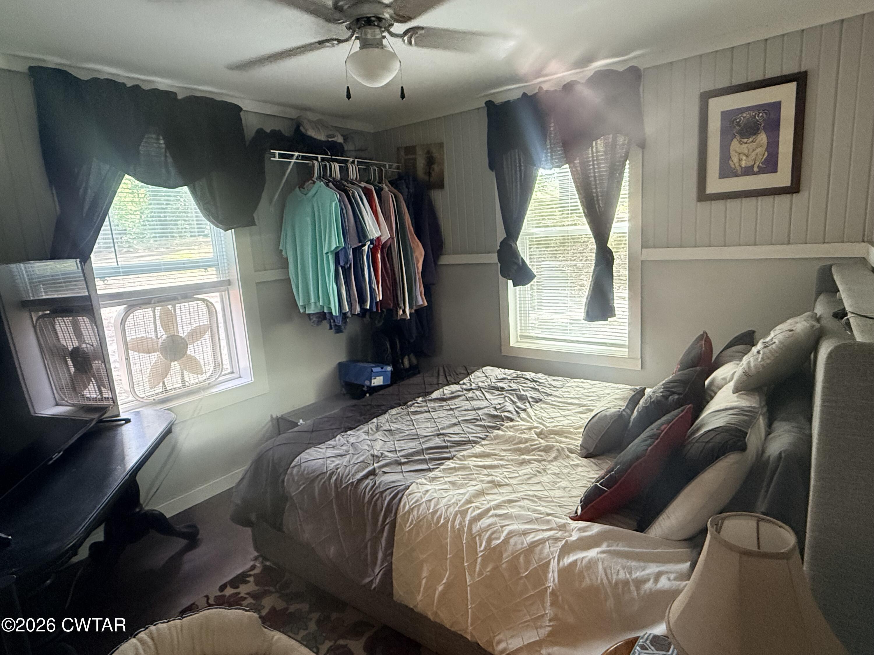 133 Maxine Nelson Road Parsons, TN 38363 - Photo 12 of 19 a bedroom with a bed and a window