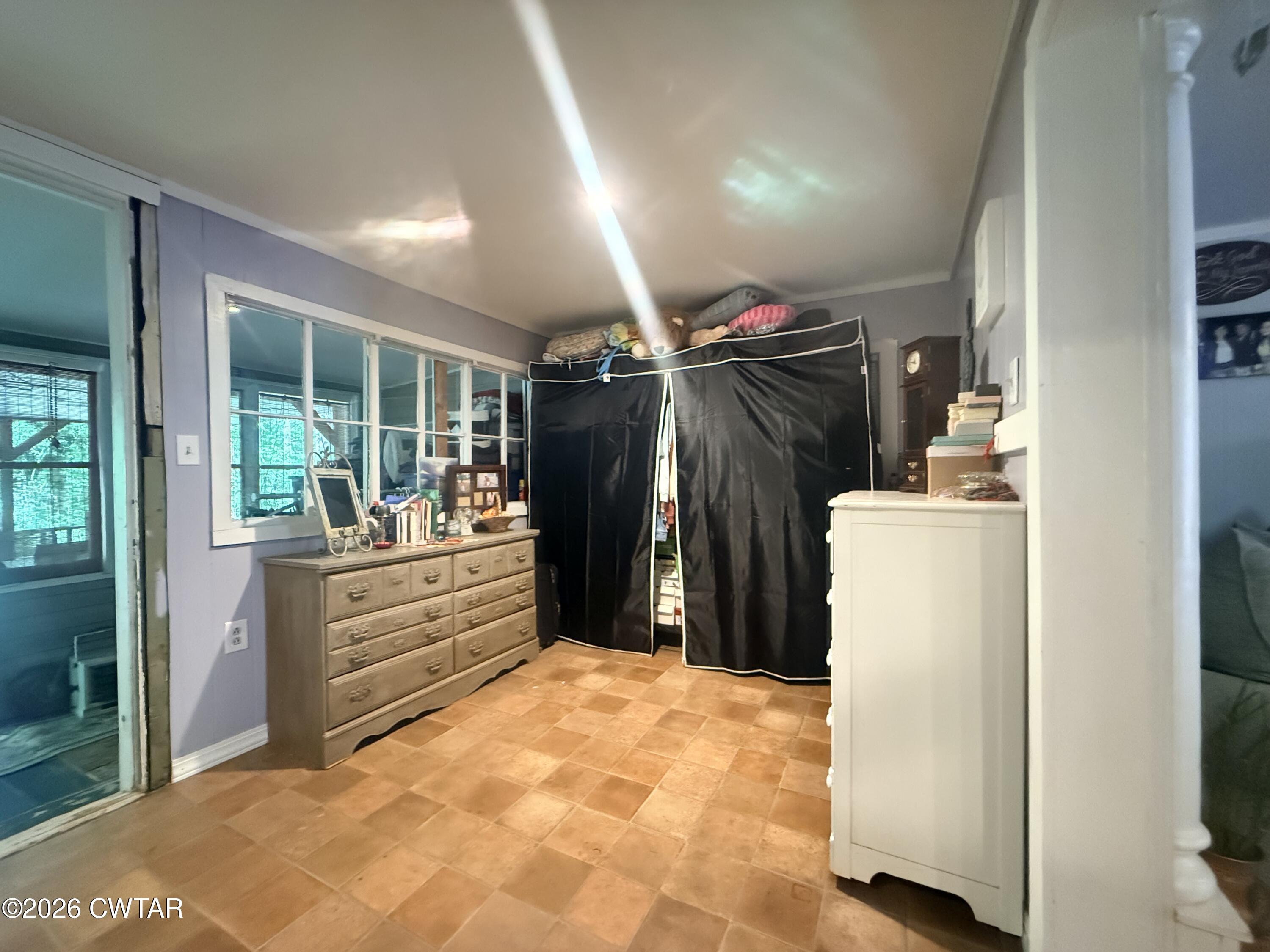 133 Maxine Nelson Road Parsons, TN 38363 - Photo 15 of 19 a storage room with cabinets