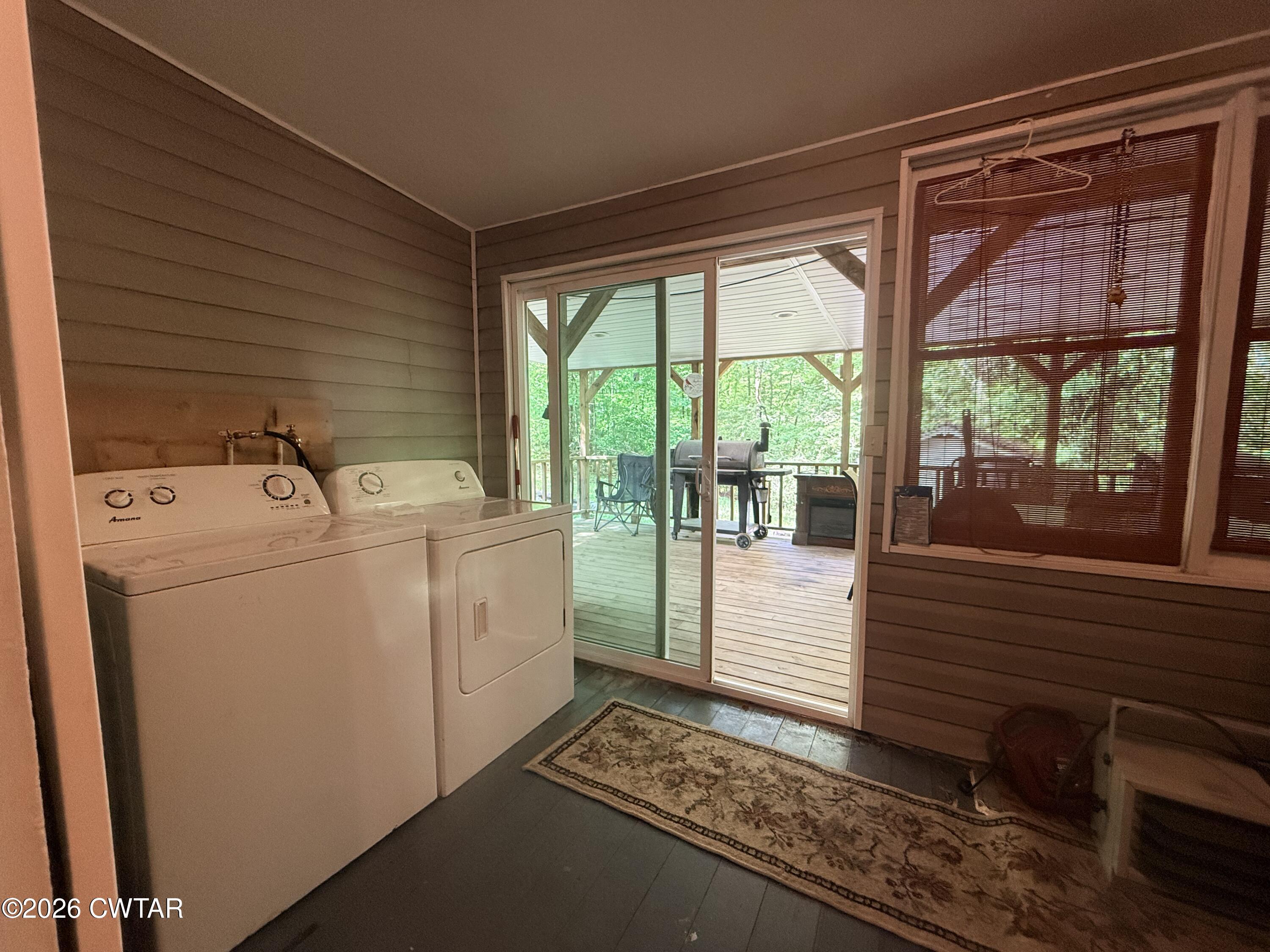 133 Maxine Nelson Road Parsons, TN 38363 - Photo 16 of 19 a utility room with dryer and washer