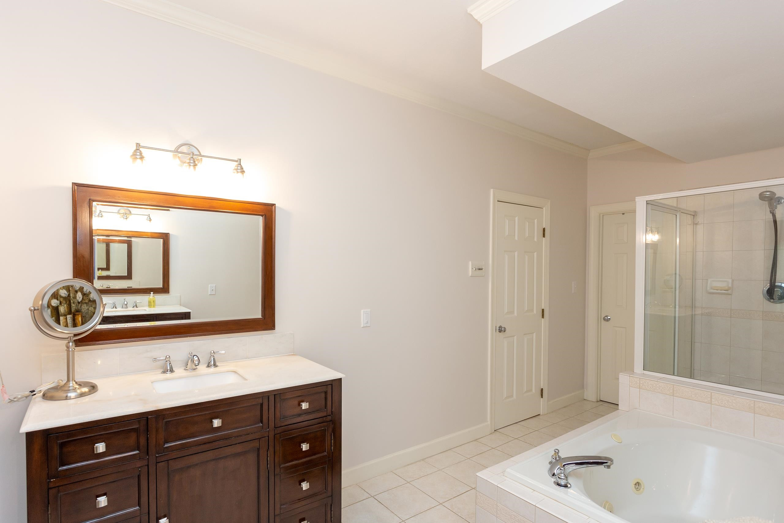 2913 Hawtree Drive Raleigh, NC 27613 - Photo 16 of 28 Large en suite bathroom has 2 stylish sink vanities for easy morning prep. Primary Bathroom