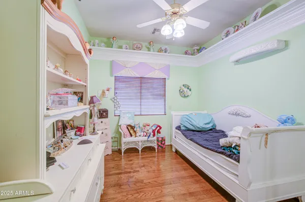 a view of a workspace with furniture and toys