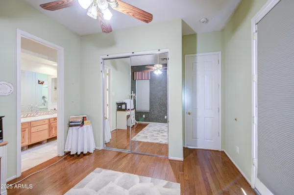 a bathroom with a shower a toilet and a sink