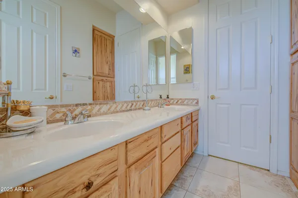 a view of a swimming pool with a lounge chairs