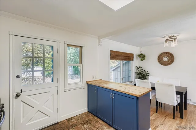 a bathroom with a sink mirror and a bathtub