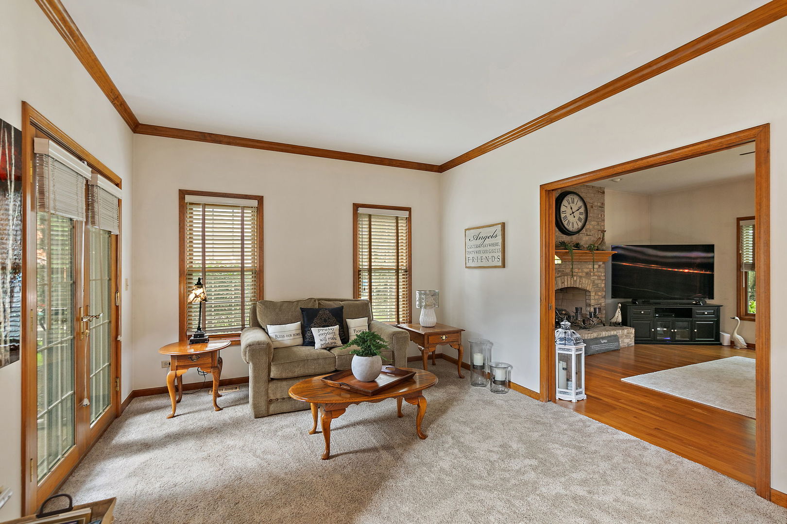 406 Catkins Way Cary, IL 60013 - Photo 6 of 32 a living room with furniture and a flat screen tv