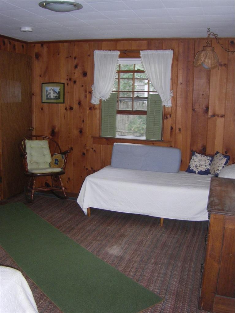 55 Captain Chase Road Dennis Port, MA 02639 - Photo 9 of 18 a living room with furniture and a window