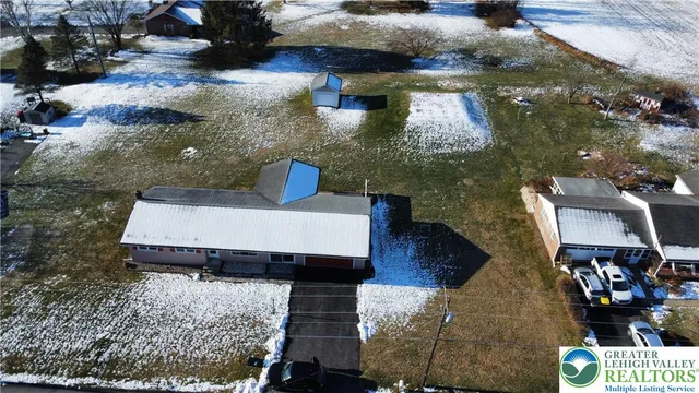a picture of a table and chairs with wooden floor