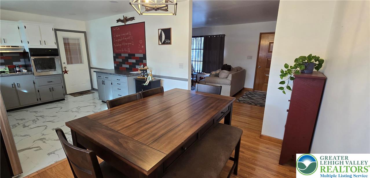 315 Long Lane Road Walnutport, PA 18088 - Photo 9 of 41 a living room with furniture and a flat screen tv