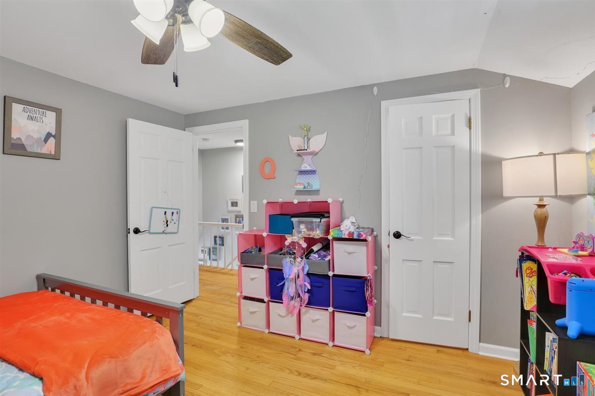 25 Silversmith Road Farmington, CT 06085 - Photo 24 of 33 a view of a room with furniture and wooden floor