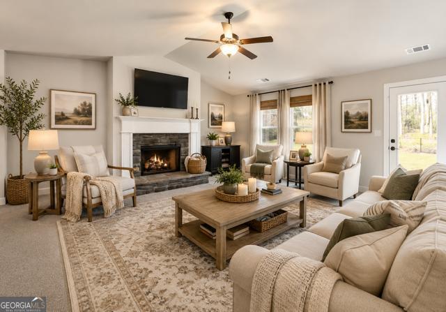 31 Rolling Woods Lane Colbert, GA 30628 - Photo 6 of 30 a living room with furniture fireplace and a large window