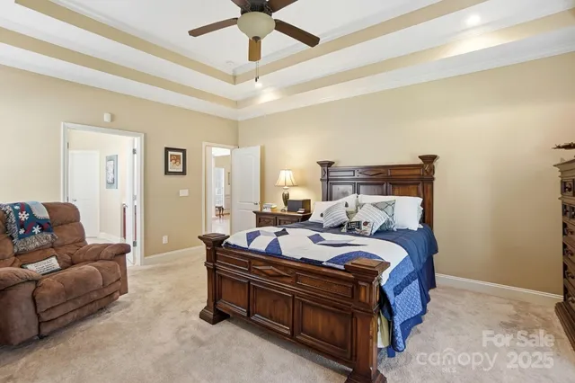 a bed room with bed and window