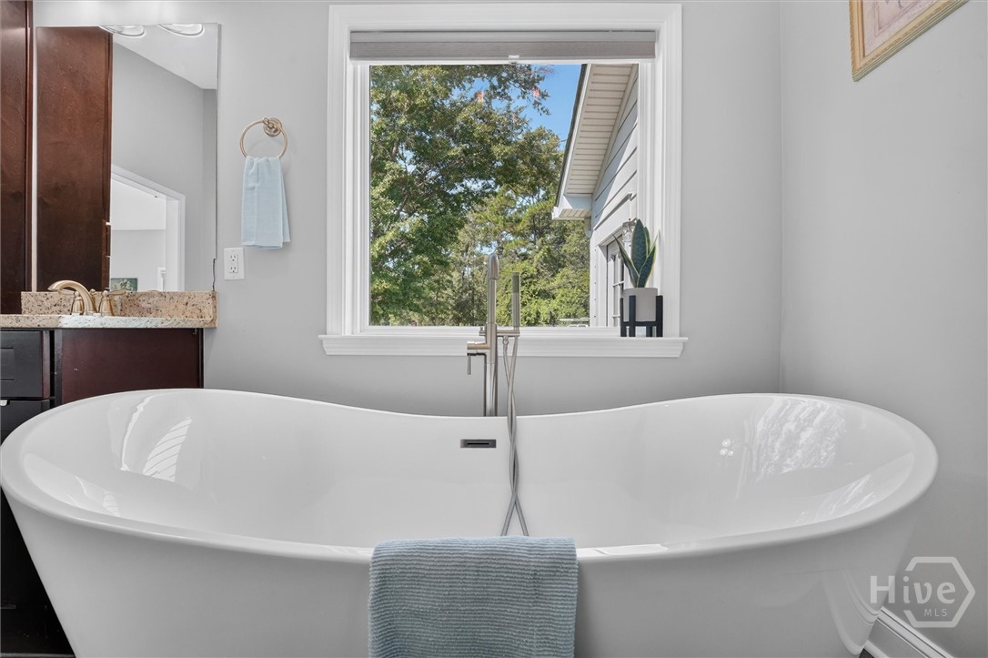 1260 Little McCall Road Guyton, GA 31312 - Photo 23 of 62 Soaking tub primary ensuite