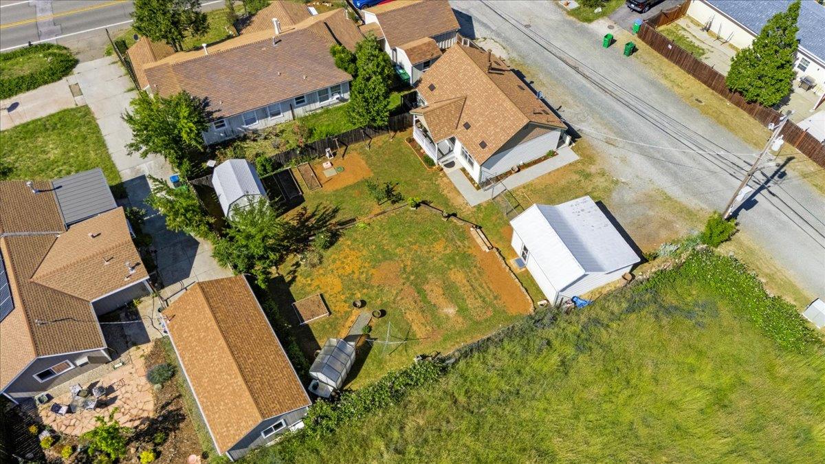 232 Upper Slate Creek Road Grass Valley, CA 95945 - Photo 2 of 48 an aerial view of a house with a yard and garden