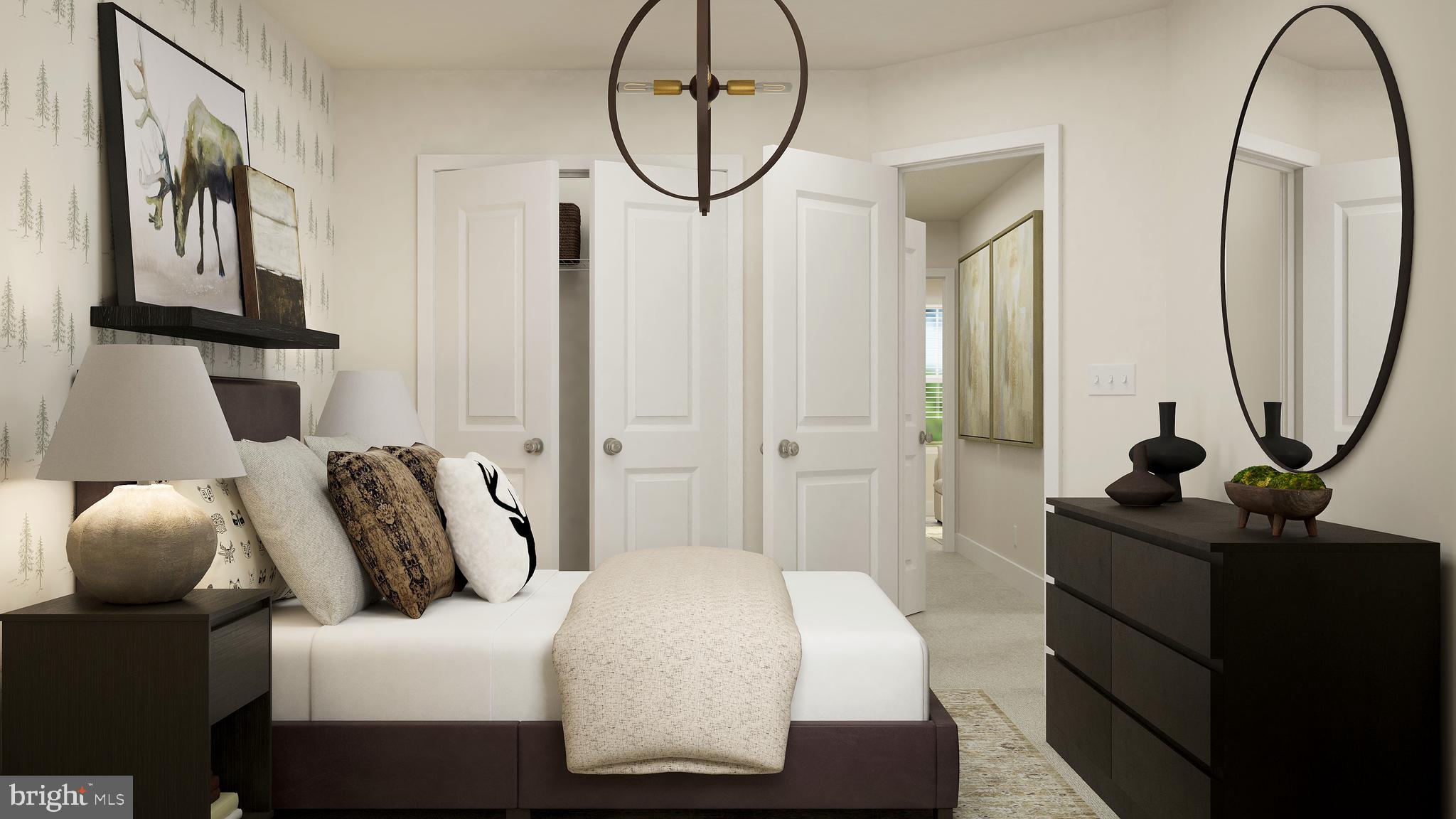 7266 Contee Road Laurel, MD 20707 - Photo 17 of 19 a bedroom with bed and a chandelier