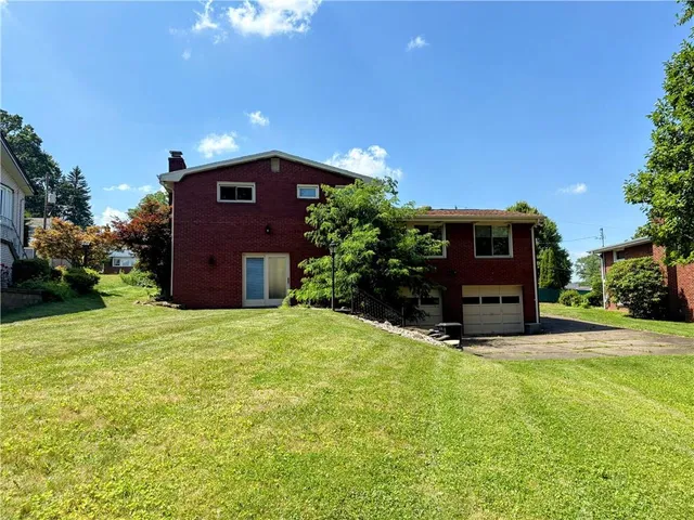 a house view with a garden space