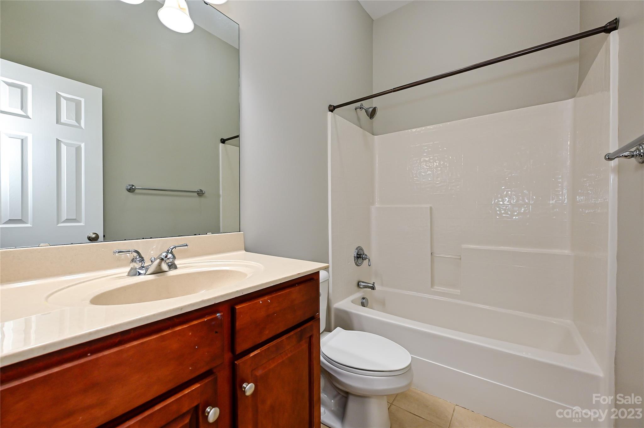 105 Mills Lane Fort Mill, SC 29708 - Photo 27 of 41 a bathroom with a sink toilet and shower