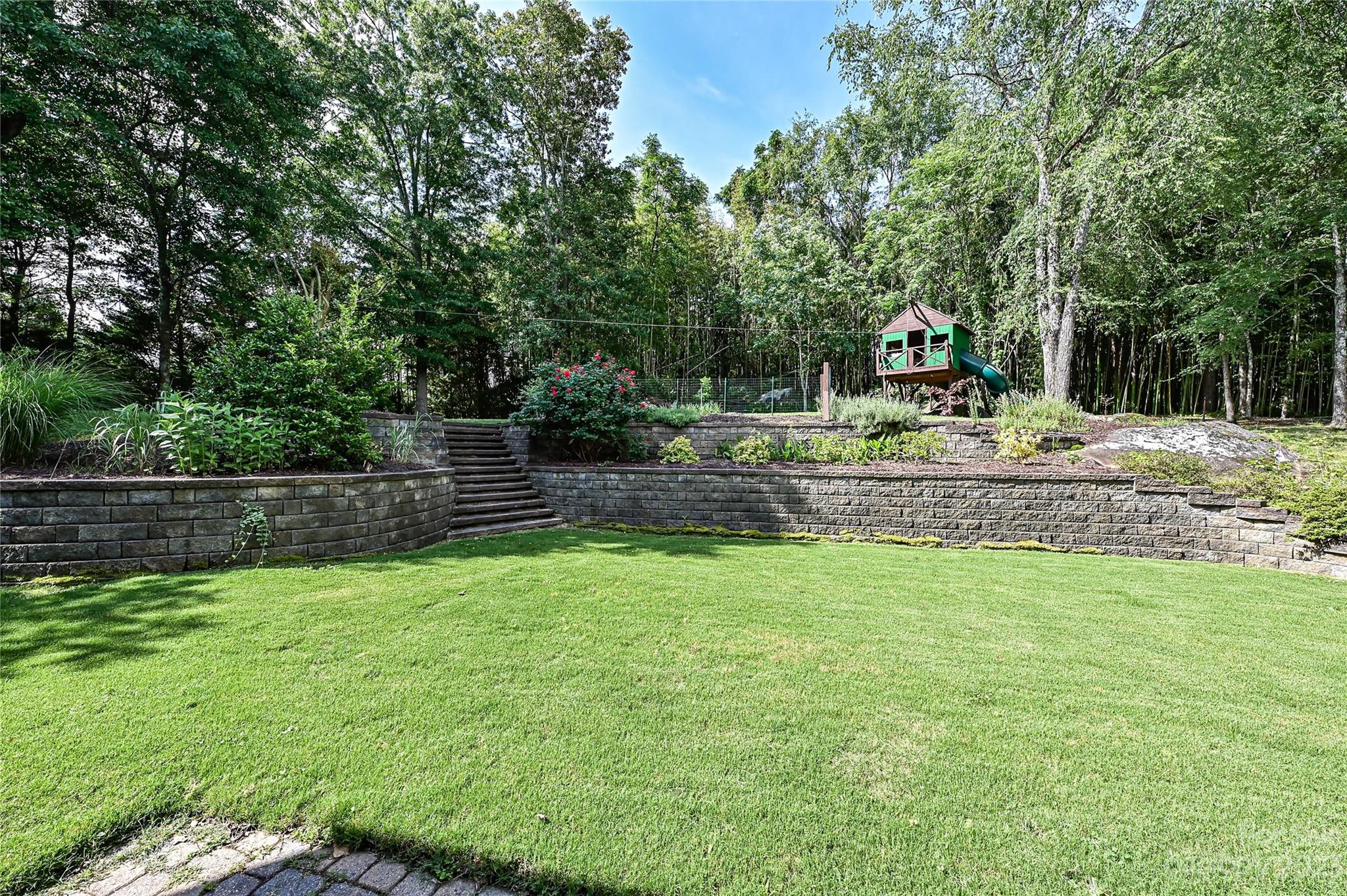 105 Mills Lane Fort Mill, SC 29708 - Photo 33 of 41 a view of a backyard