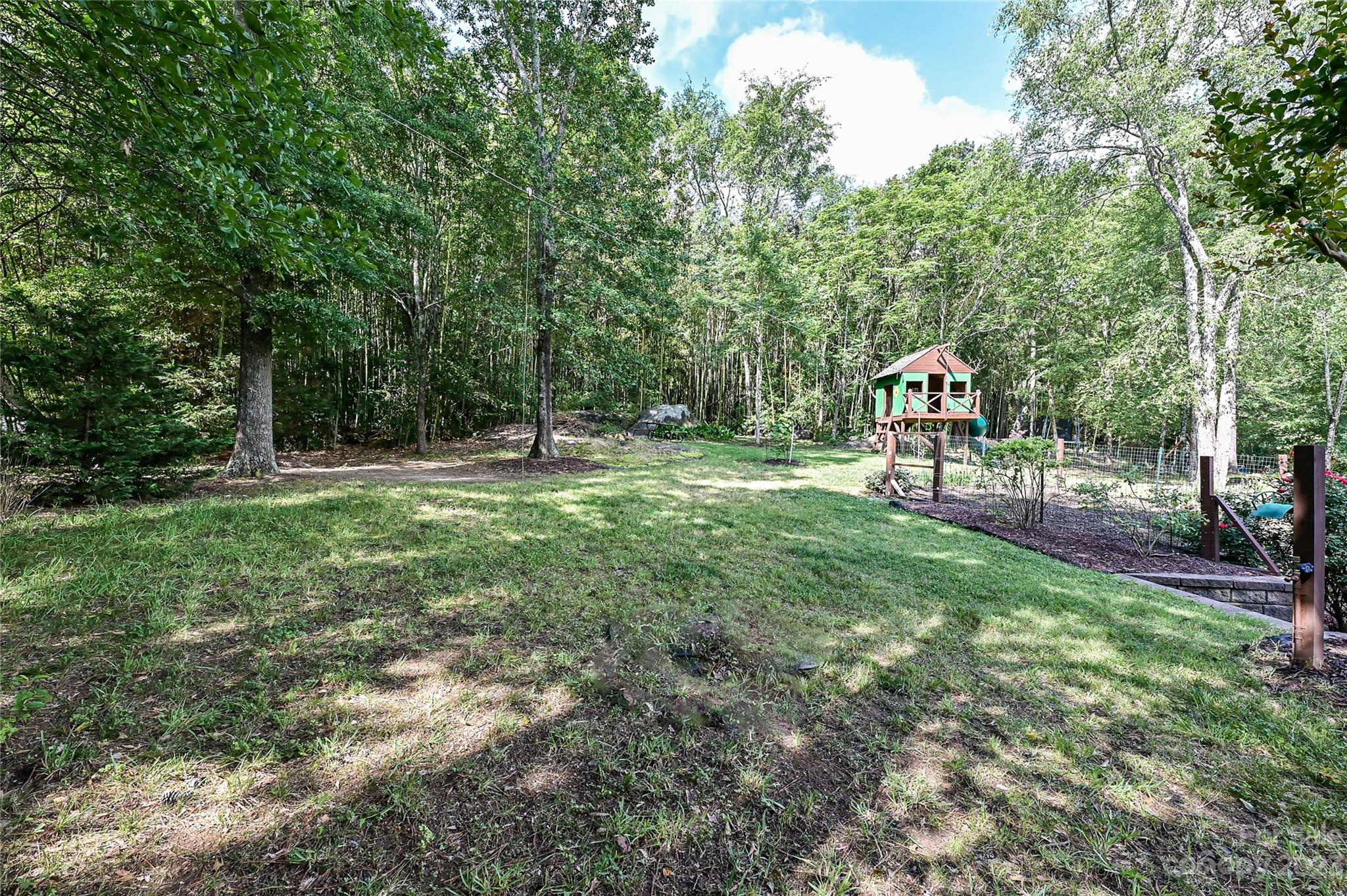 105 Mills Lane Fort Mill, SC 29708 - Photo 34 of 41 a view of outdoor space with deck and yard