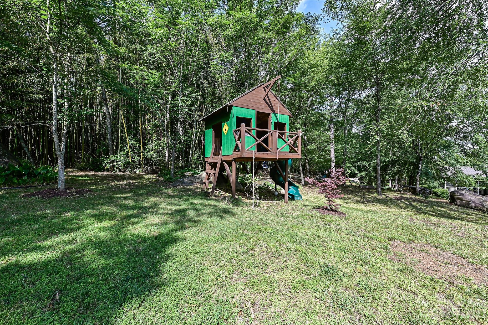 105 Mills Lane Fort Mill, SC 29708 - Photo 35 of 41 a small house in middle of the green field